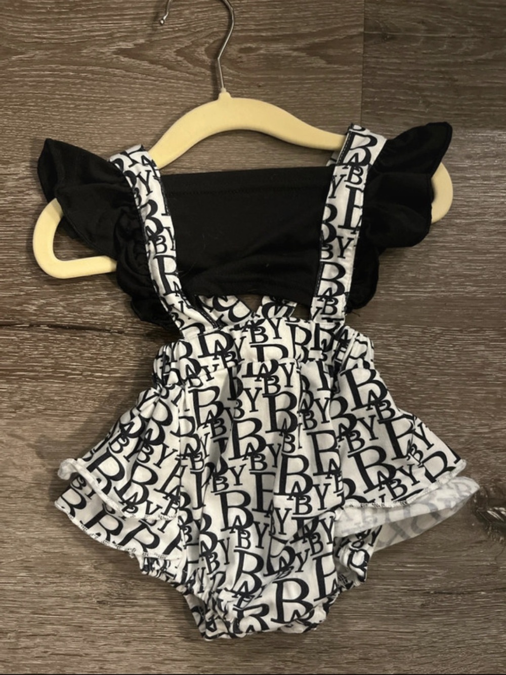 SHEIN Black Top with White Logo Suspender Romper
